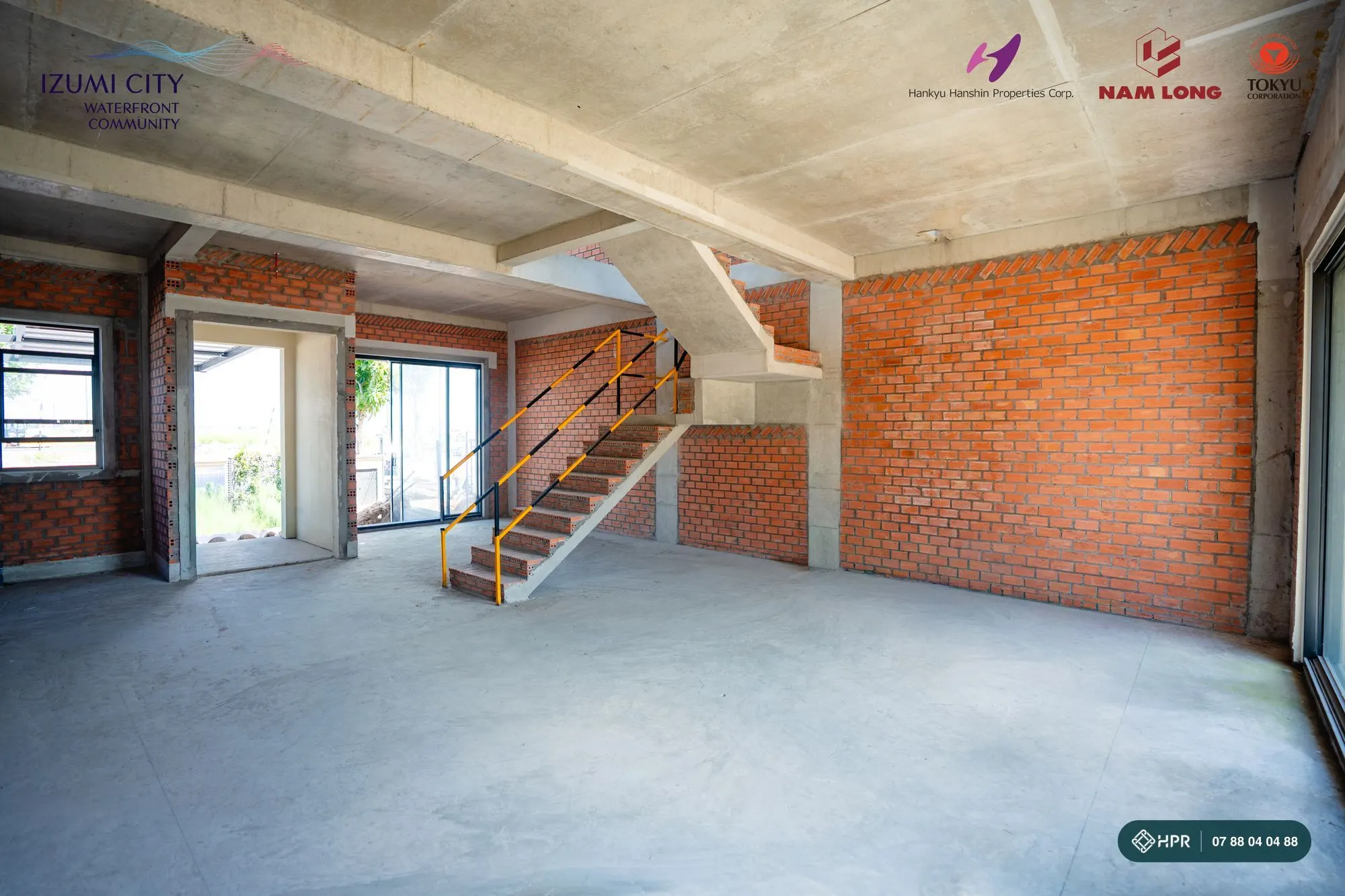 Tầng trệt căn nhà Izumi Canaria đã xây tường, đổ cầu thang, tháng 10/2026